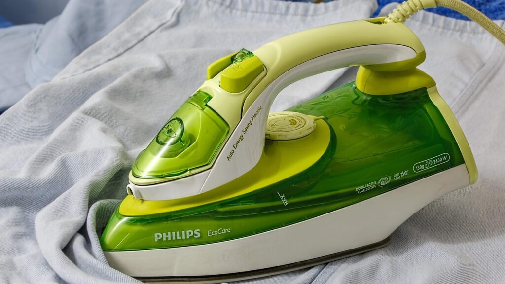 A technician checks an iron at the elMeistrai service centre in Klaipėda