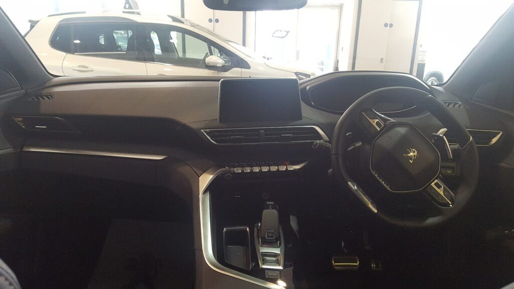 Peugeot car navigation screen with a map