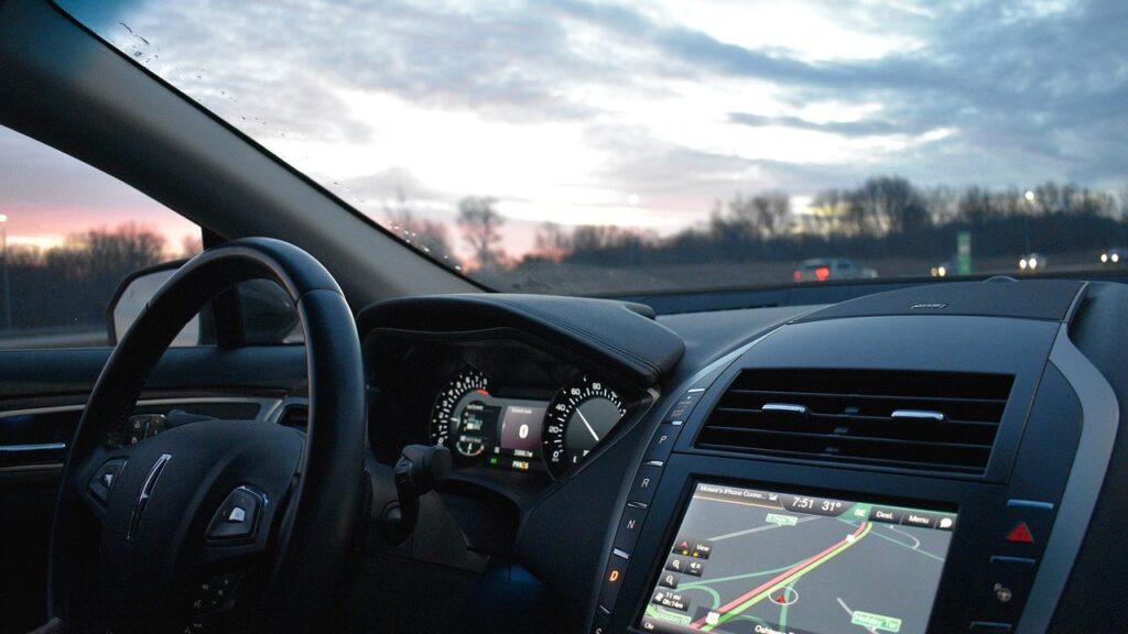 Saab navigation map disc and the car's instrument panel